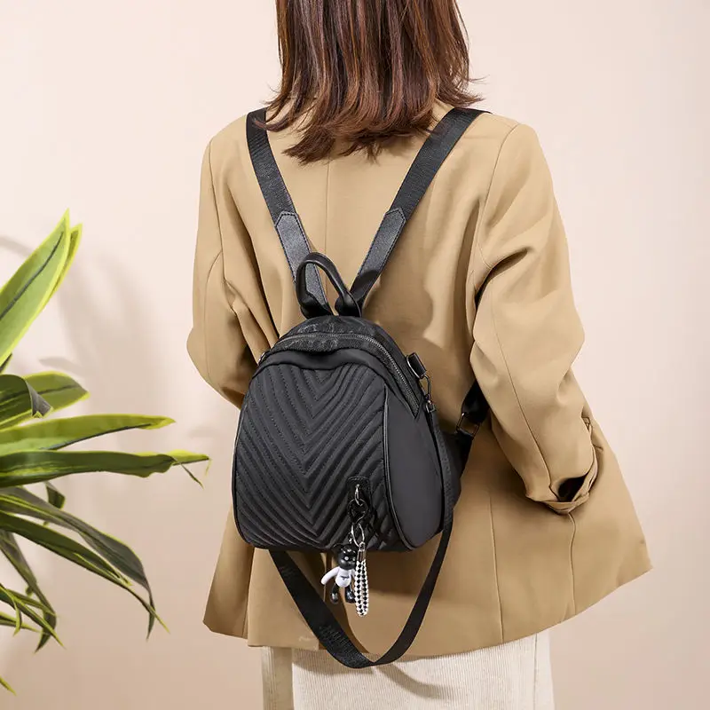 

New oxford cloth backpack female Korean embroidered thread shell travel backpack solid color multi-purpose female shoulder bag