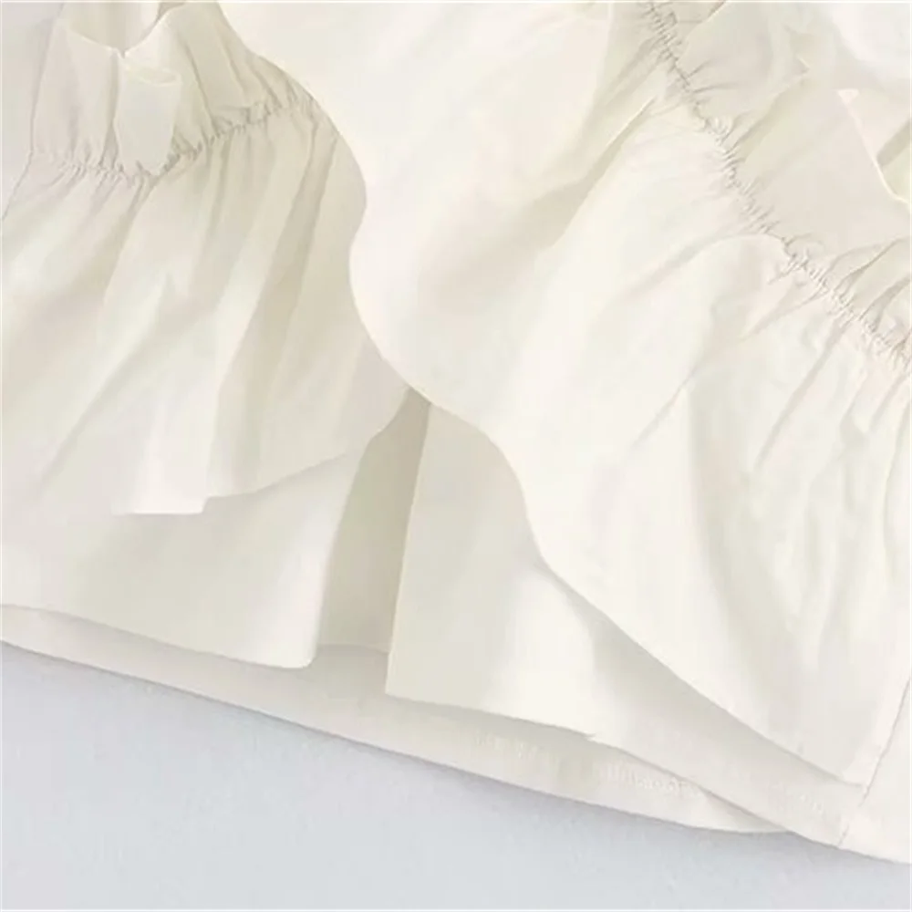 

2020 spring and summer women's new short-sleeved ruffled V-neck stretch design shirt stitching laminated decorative shirt