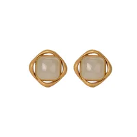 S925 sterling silver gold-plated natural Hetian jade ear studs refined personalized simple spiral geometric women's earrings