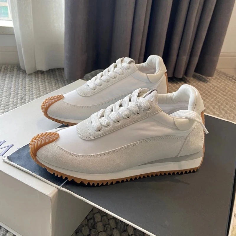 

Spring and autumn women's casual sports shoes frosted color matching white shoes increased thick-soled German training shoes