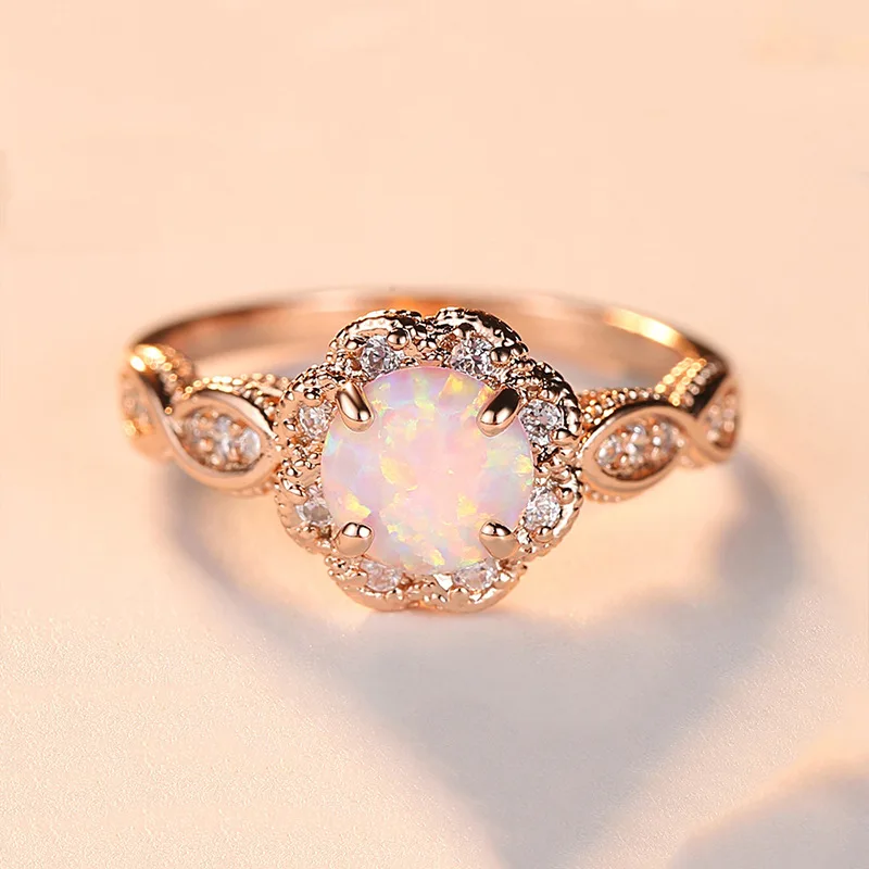 

New Fashion Women's Creative Fashion Trend Resin Opal Rose Gold Hollow Ring Rhinestone Ring Jewelry Wholesale