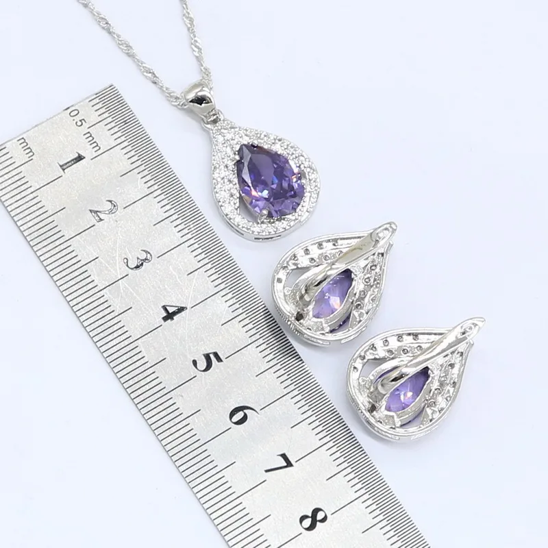 Искусственный роскошный браслет серебряного цвета с фиолетовым цирконом