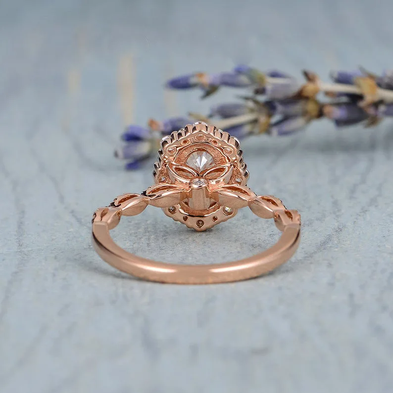 

Imitation of mozambique drill elliptical inlay zircon engagement ring