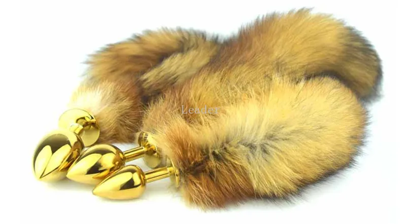 Анальная пробка металлического размера золотистая металлическая реальные