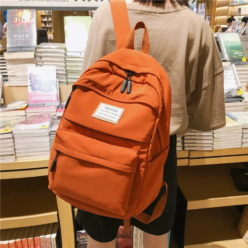 

Рюкзак женский нейлоновый, однотонный, с несколькими карманами