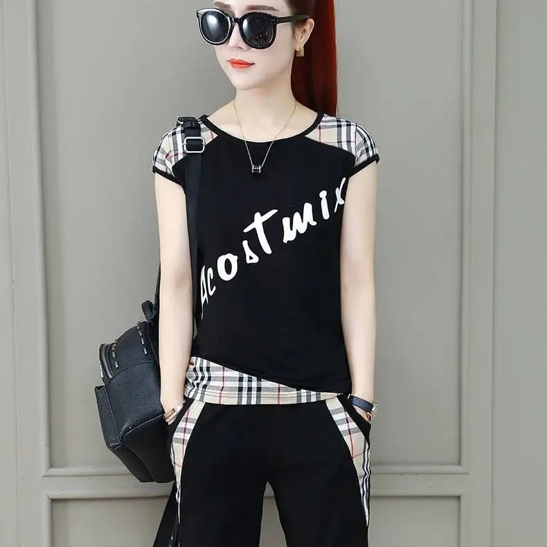 

Sportswear women's summer short sleeve new women's large Capris splicing fashion leisure two piece set