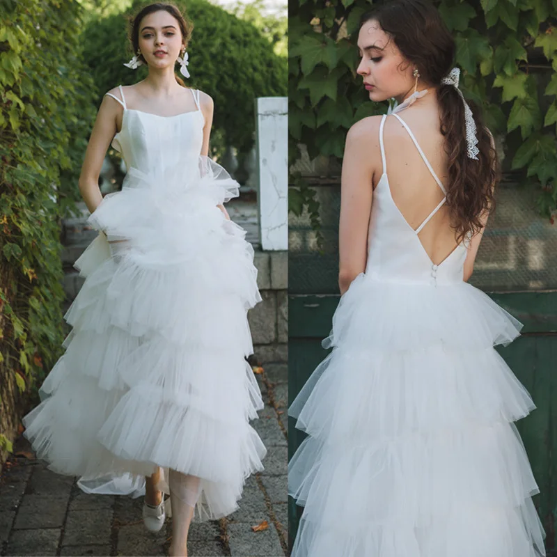 

Simple Ivory Puffy Tutu Wedding Dresses Sleeveless A Line Sexy Backless Spaghetti Straps Long Tiered Country Garden Bridal Gowns