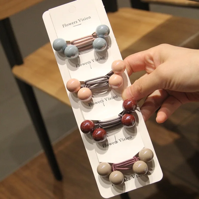 

2pcs/lot Korean version of the headdress double headband rubber band acrylic hair ring cute ball card with hair rope