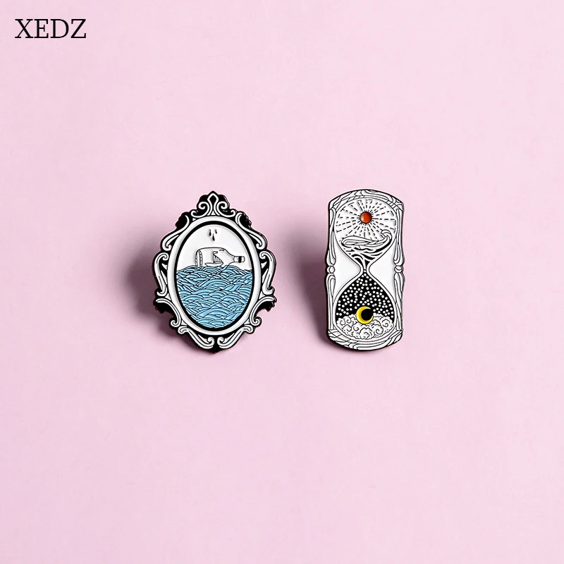 

XEDZ New Drift Bottle Mirror Sun and Moon Reversed Hourglass Brooch Fashion Noble Magic Mirror Badge Jewelry Gift