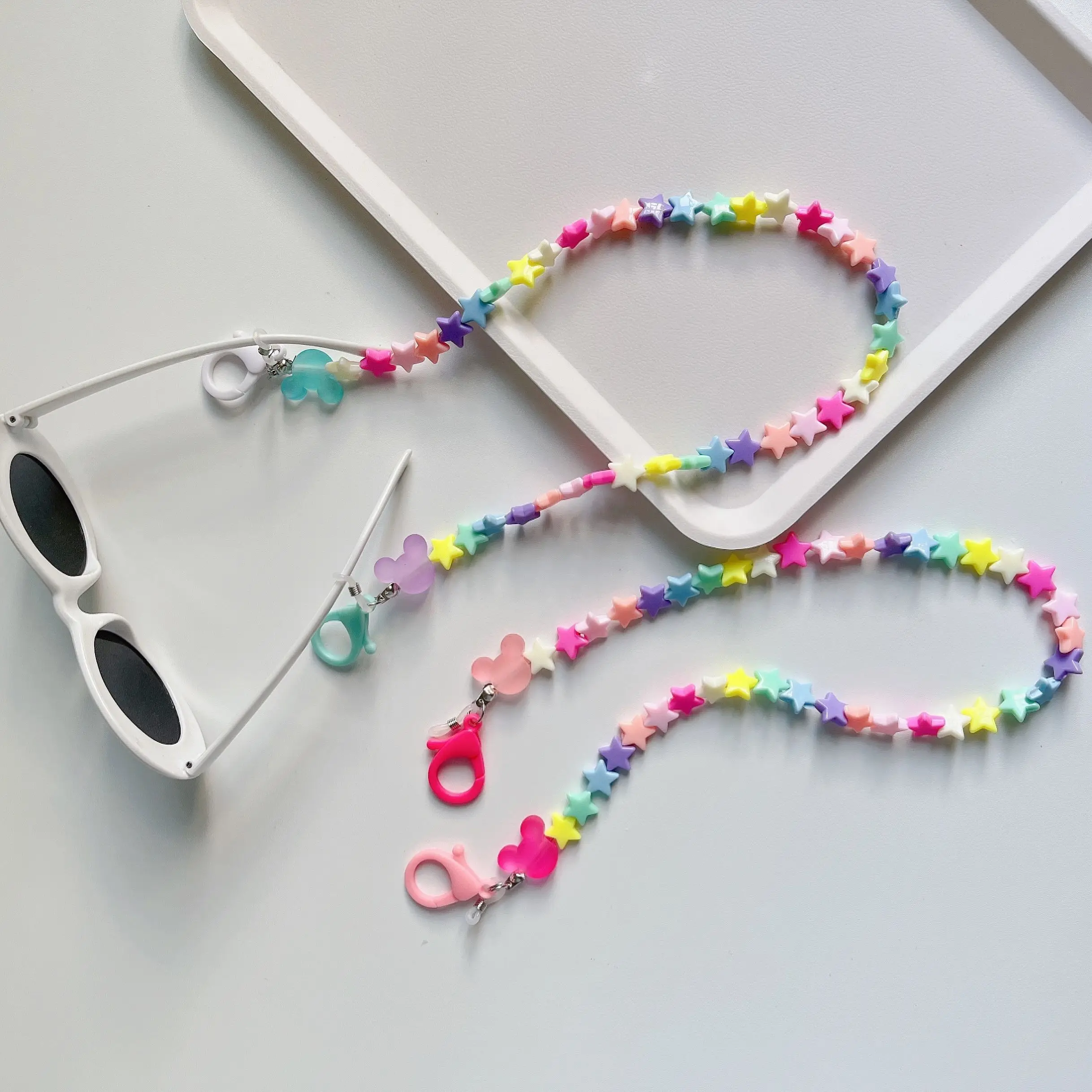 

Ожерелье-цепочка для очков, креативное мультяшное ожерелье конфетных цветов со звездами, акриловым шнурком, с цепочкой для наушников, с цеп...