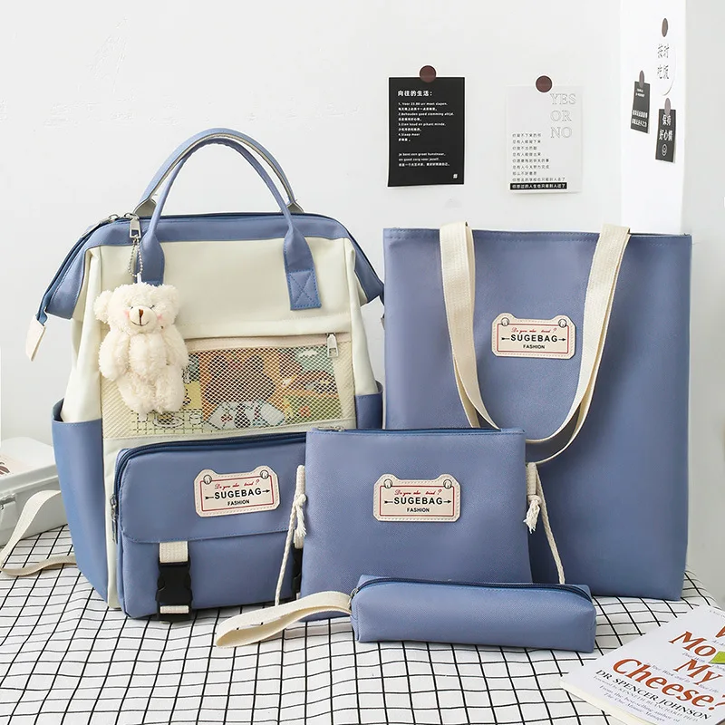 

Four-piece female backpack wild new Oxford cloth campus student casual fashion bag Korean version large-capacity backpack