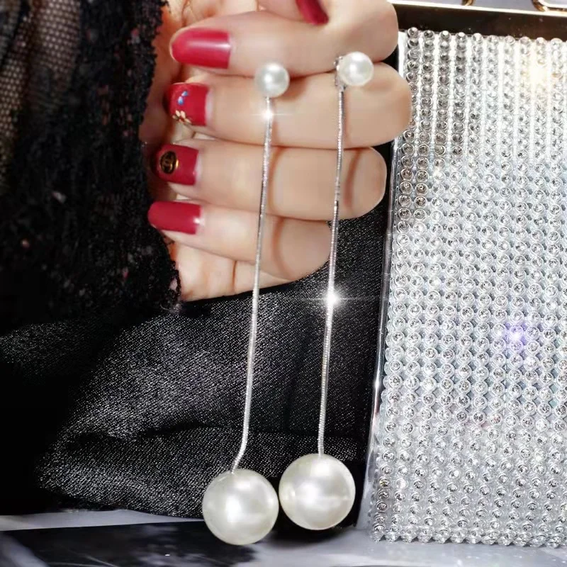 

Silver needle temperament long earrings pearl earrings European and American fashion personality earrings simple free shipping