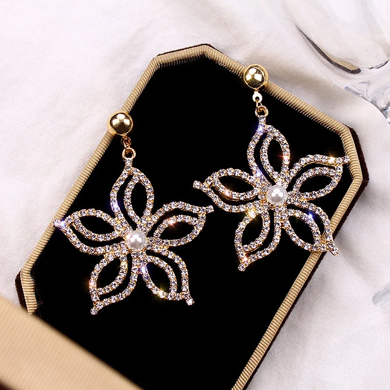

SNCSDK Trendy rhinestone pentagonal flower Women's Stud earrings exaggerated temperament elegant Women earrings