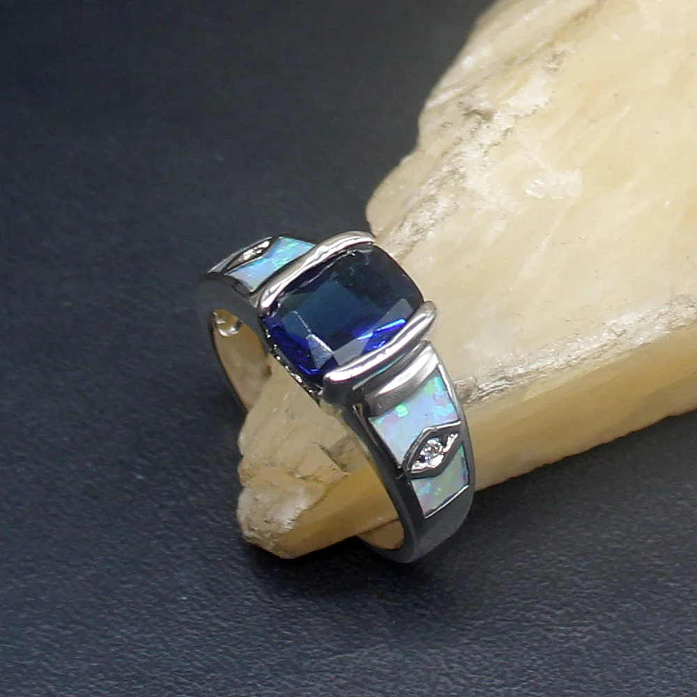 

Женское кольцо из серебра 925 пробы с опалом и сапфиром