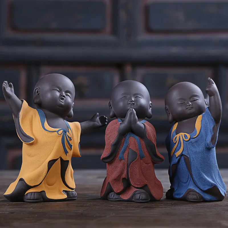 

Ceramic little monk statue Purple sand colored pottery sand handmade sculpture Home decoration accessories Tea set decoration