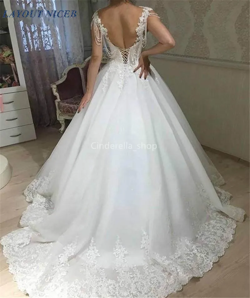 

Princess Ball Gown Wedding Dresses Lace Appliques Cap Sleeves Beaded Corset Back Arabic Dubai Bridal Gowns Vestido De Novia