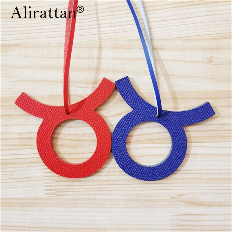 

New Charm 12 Zodiac Taurus Horoscope Constellation Keychain Pendant Women Backpack Bag Charm Fashion Genuine Leather Charm Ins