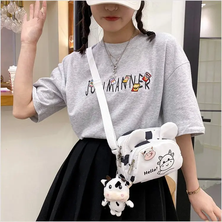 

Japanese ins funny personality cute cartoon color contrast cow wave point soft girl student satchel Korean version Satchel