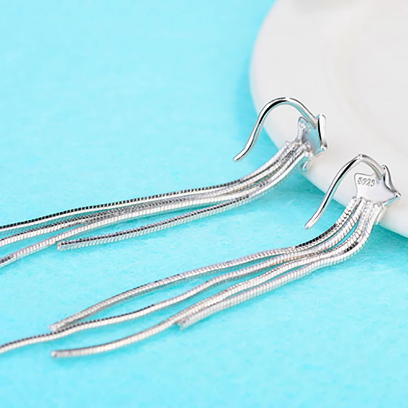 Элегантные длинные висячие серьги в этническом стиле со звездами из