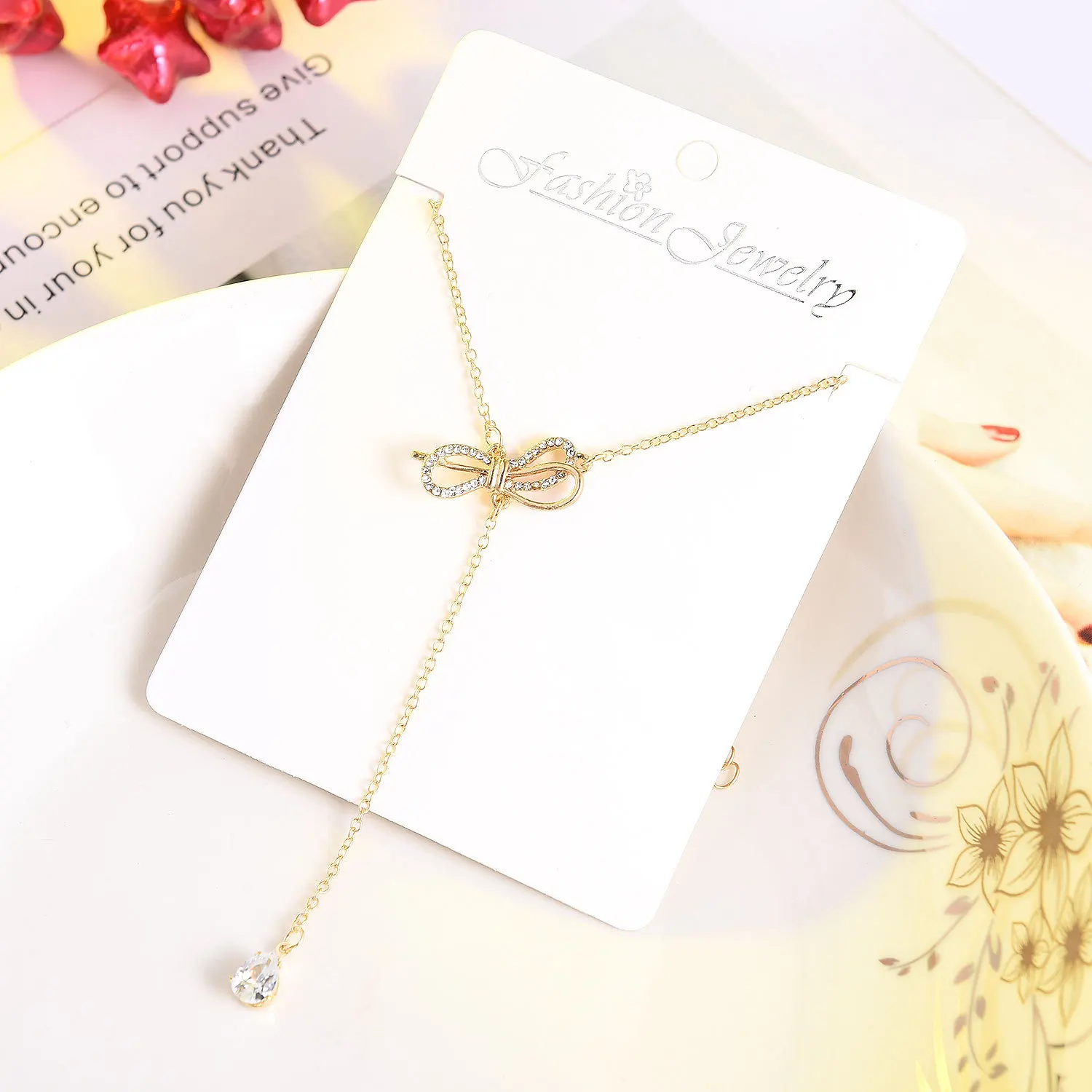 

New Fashion Jewelry Fashion Bow Necklace Lady Tassel Short Drop Drop Pendant