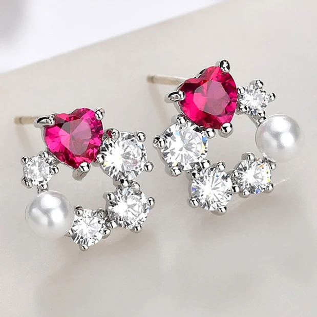 Изысканные серебряные серьги иглы для девушек с красным корундом и