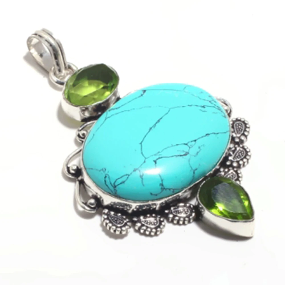 

Turquois + Peridots Pendant Silver Overlay over Copper , 71 mm, FRP0399