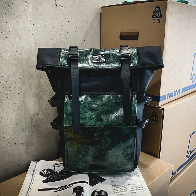 

Street trend couple curling buckle large capacity travel backpack college student bag men and women 15-inch computer bag