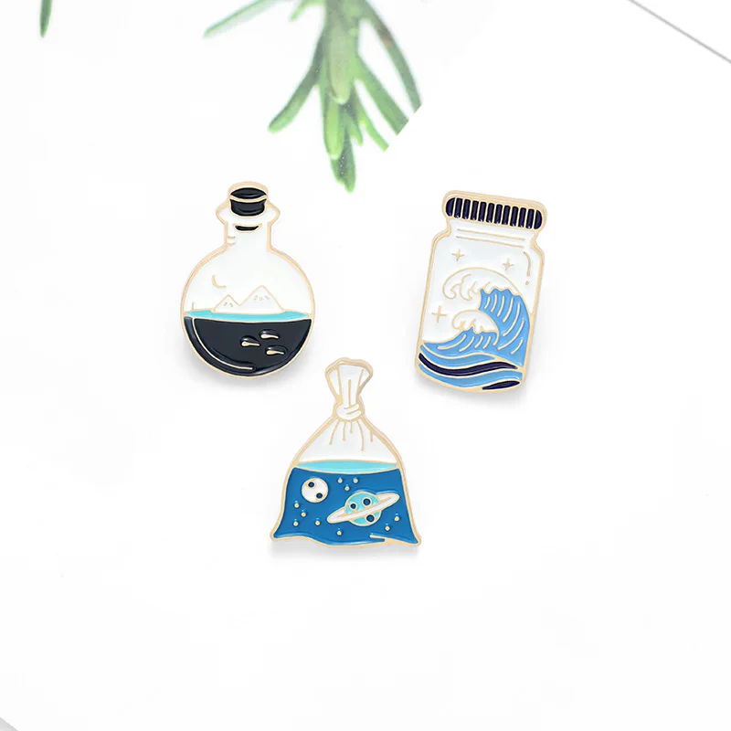 

Jewelry Canned Ocean Stars Enamel Pins Drifting Wishing Bottle Brooches Planet Ocean Mountain Universe Clothes Bag Badges Gifts