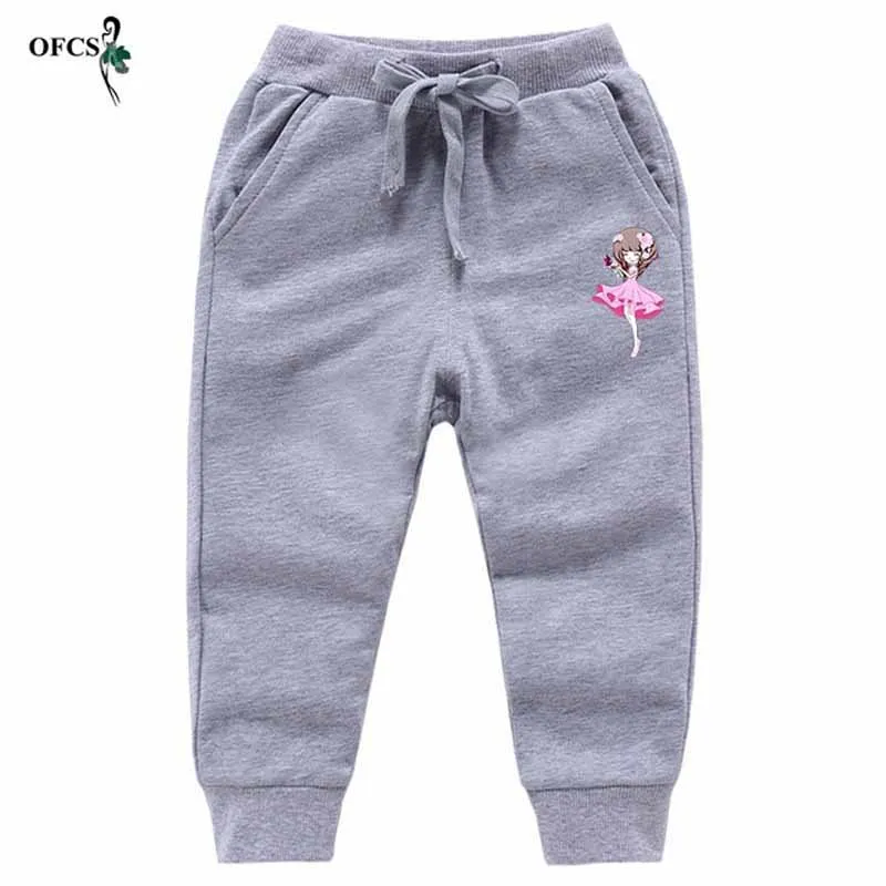 Розничная продажа Детские брюки Повседневные спортивные штаны с принтом для
