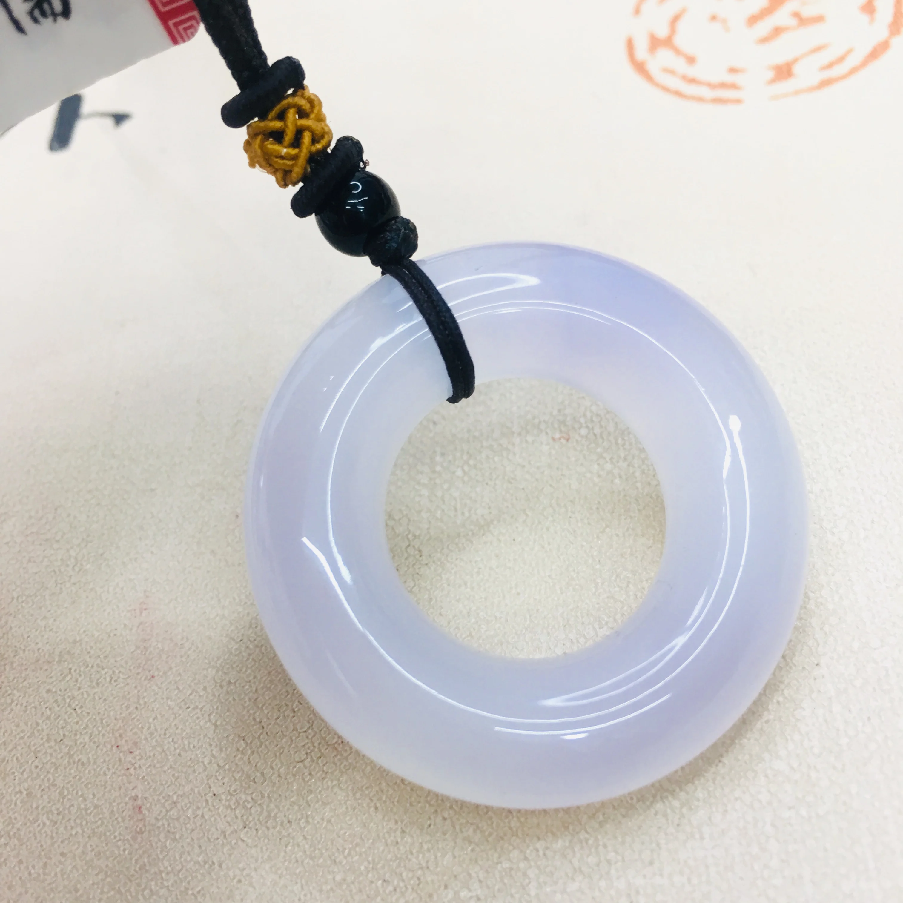 

Natural Brazilian White Pendant Pendant Carved Light Purple Donut Pendant with Hand-knitted Two-tone Necklace