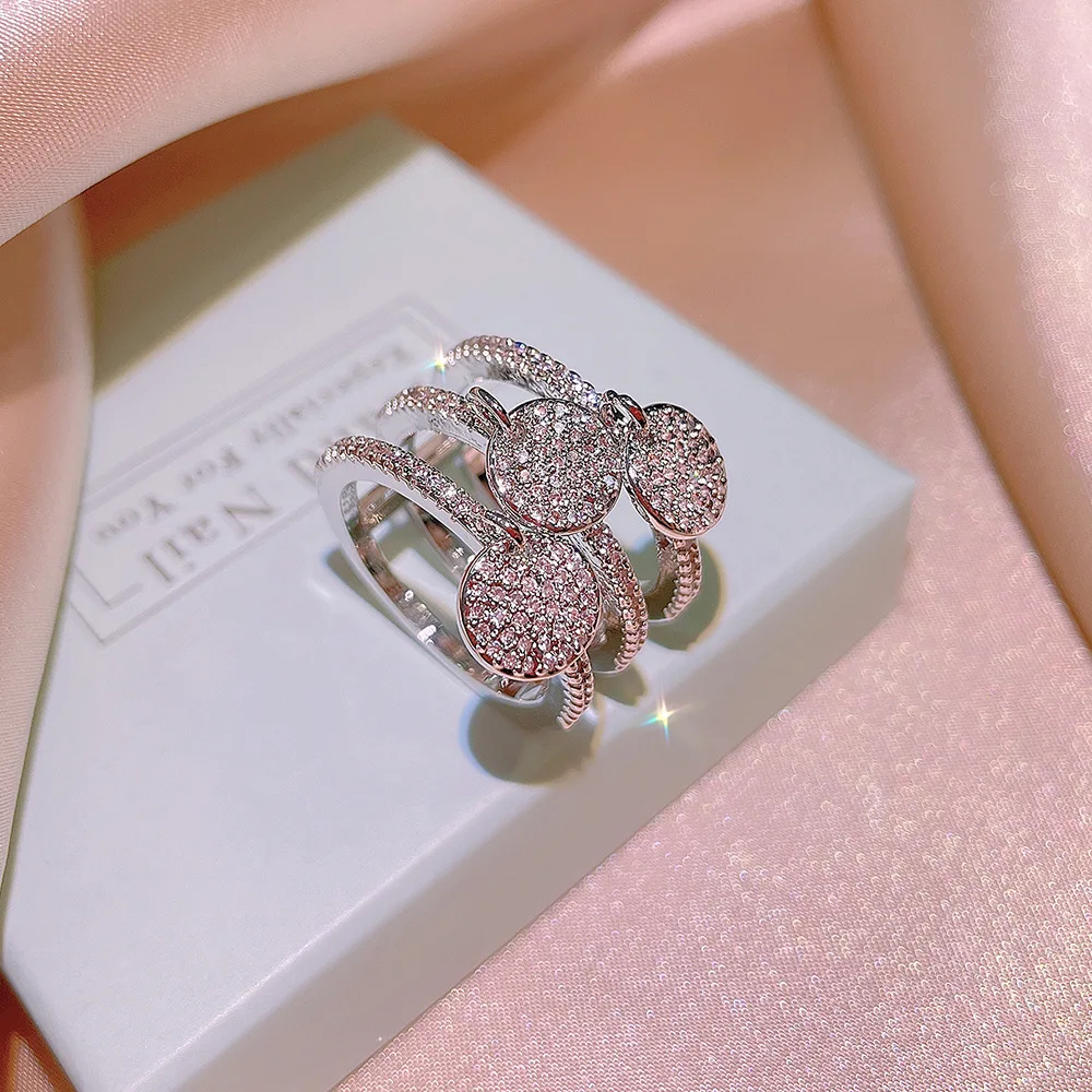 

Fashion luxury light luxury group inlaid pink diamond ring female zircon flower European and American full diamond ring