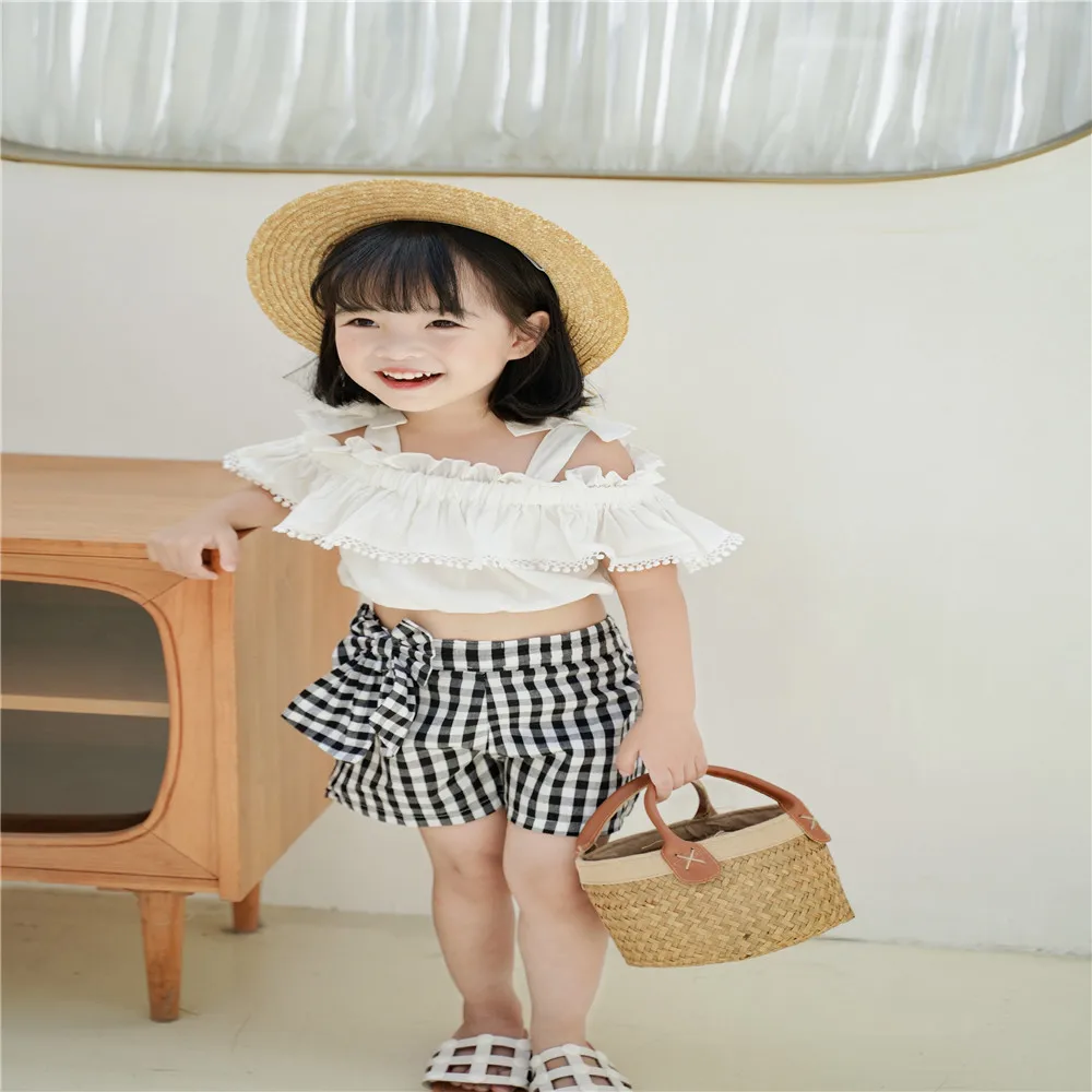 

Summer Sweet 2 Pcs Baby Girls Children's Sets White Lace-Up Bow Off Shoulder Short Sleeve T-Shirt Tops + Plaid High Waist Shorts