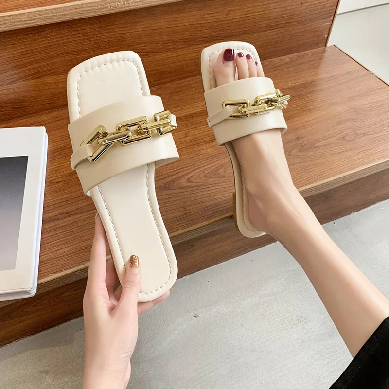 

Home Slippers Women's Slides Beach Shoes Fashion Pantofle Rivet Massage Sabot Summer Luxury 2021 Flat PU Basic Metal Decoration