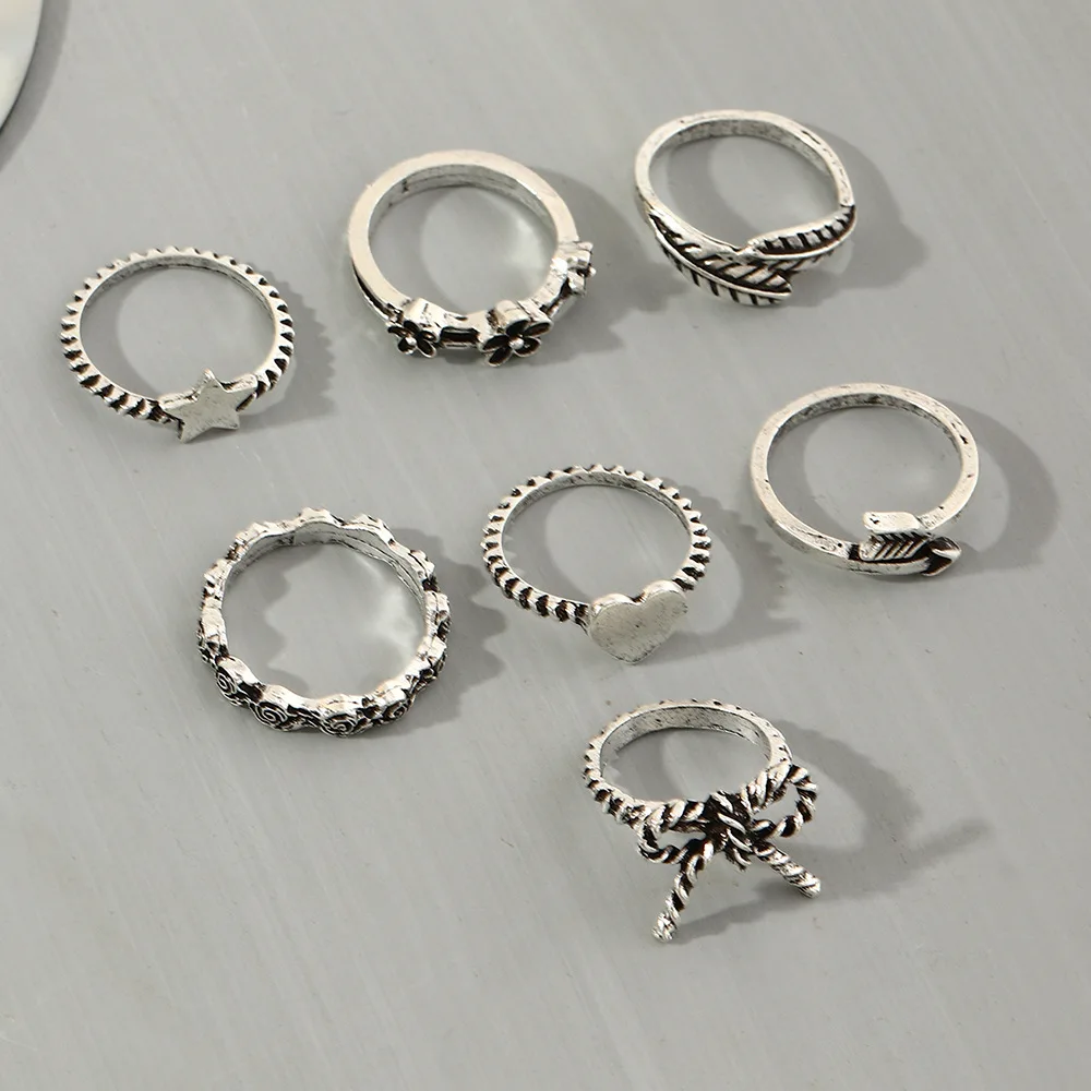 

7 Pcs/Set Bohemian Rings Set Exquisite Bowknot Heart Leaf Star Arrow Flower Ring Women Finger Rings Set Jewelry Gift for Women