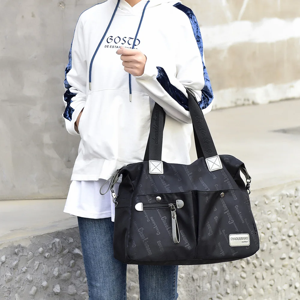 2021 new version of Oxford cloth shoulder bag men and women casual waterproof messenger large capacity fashion simple handbagW34