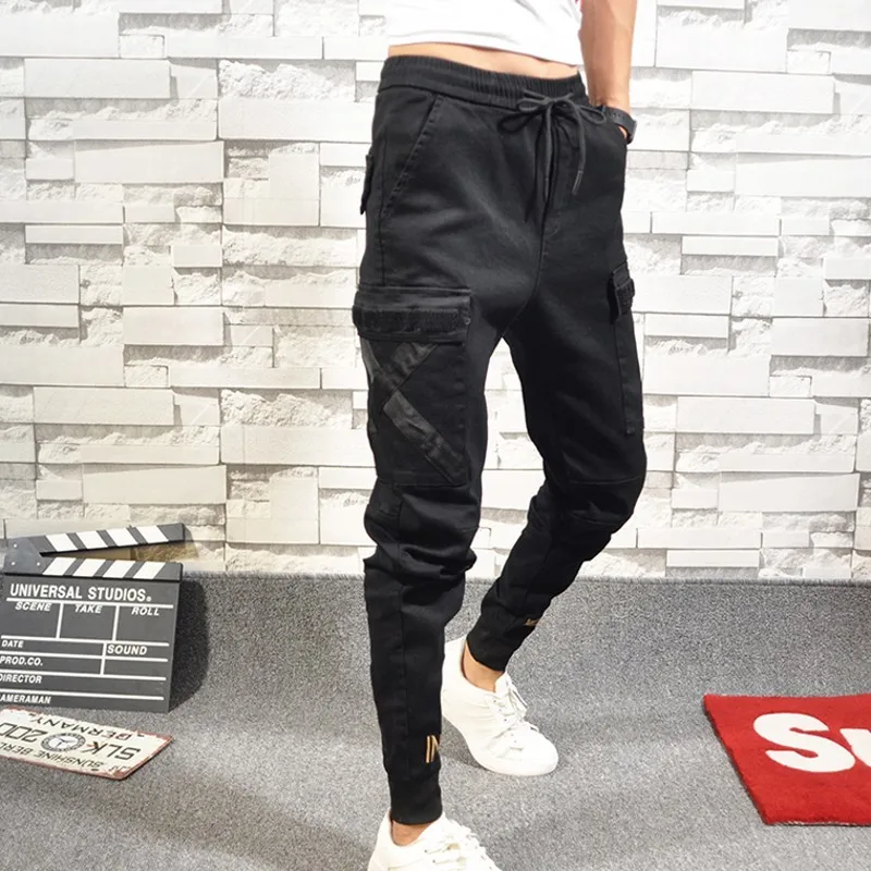 

New Arrival Fashion Embroidery Casual Pants Men Slim Fit Jogger Pencil Trousers Elastic Waist Solid Black Clothes Male
