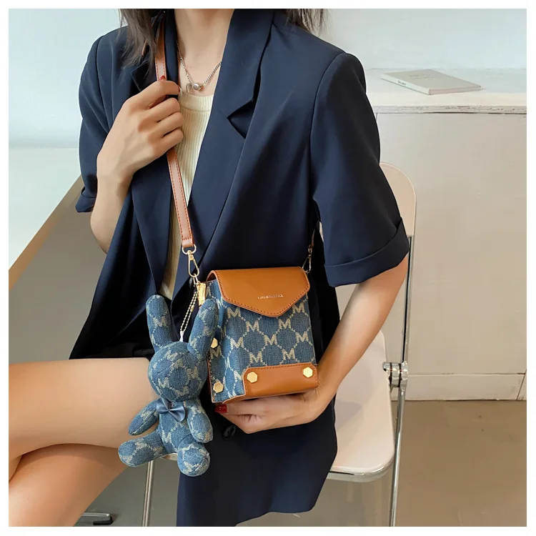 

Mini coin purse printing fashion messenger female bag 2021 new one-shoulder rivet vertical square bag mobile phone bag