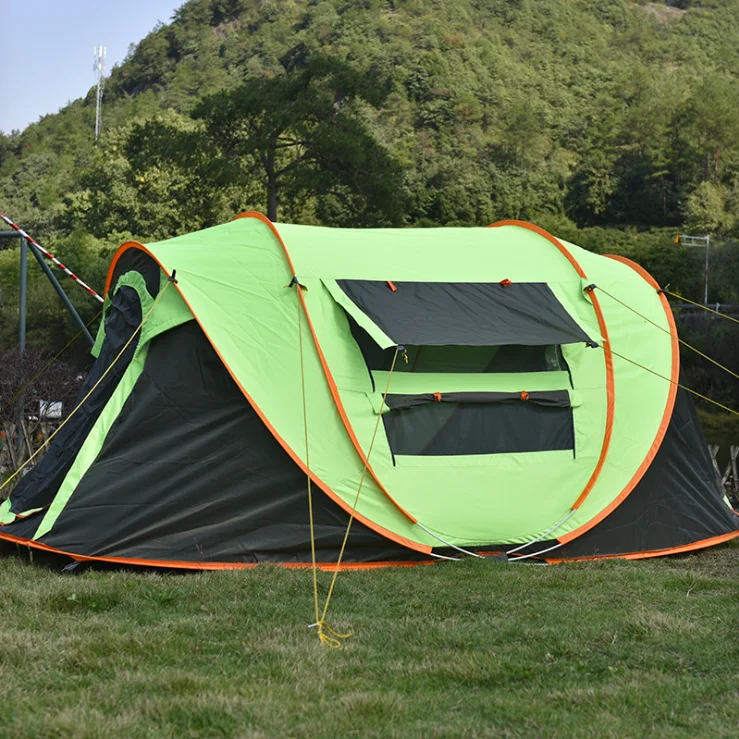 

2 people toss the account without setting up a quick open tent outdoor camping tent camping rainproof boat account