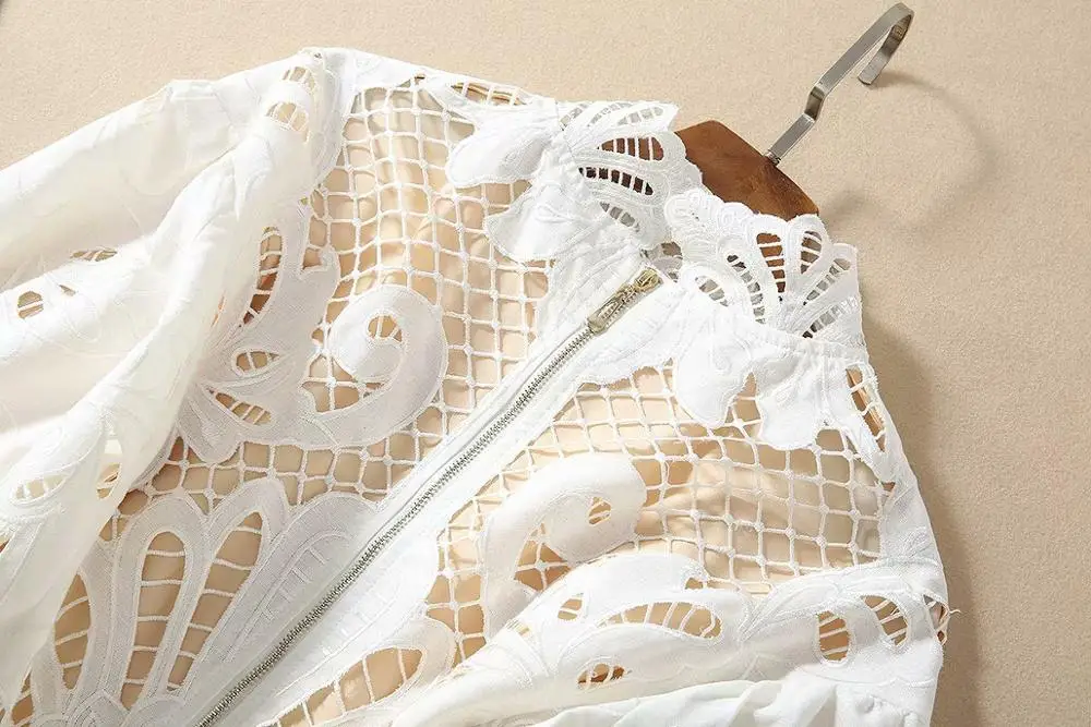 

Spring 2020 for European and American women's wear Lantern sleeves stand collar Water dissolve flower hollow out white shirt