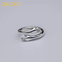 qmcoco silver color creative couples engagement adjustable ring trendy simple embrace party jewelry accessories for women gifts