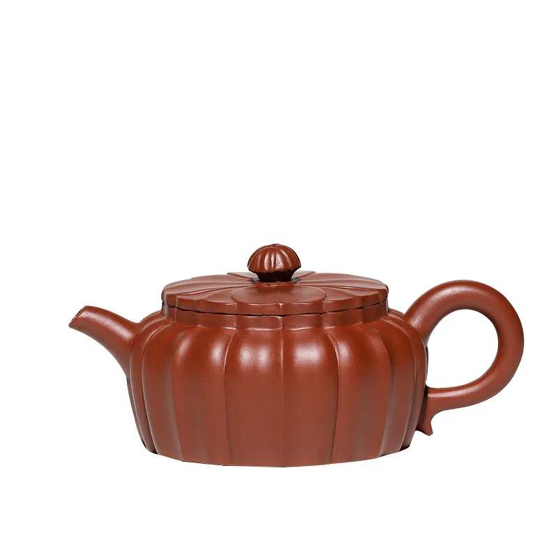 

Yixing Zisha teapot is made by hand