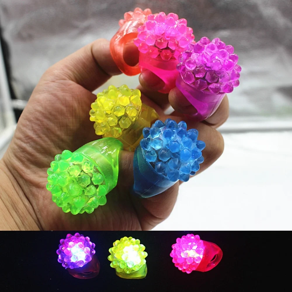 

100PC Glowing Strawberry Rings Light LED Fluorescent Ring Finger Light Jelly Bumpy Rings Flashing LED Bubble Rave Party