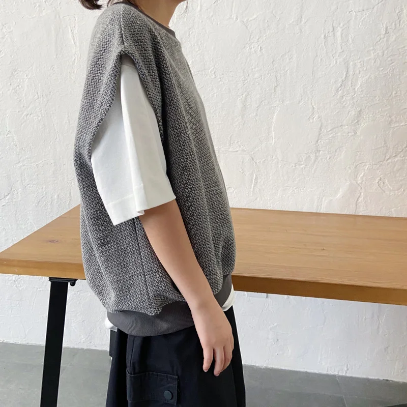 

Autumn and winter women's sweater casual solid color round neck sleeveless loose sweater