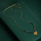 Цепочка с подвеской в богемном стиле женская, длинное винтажное ожерелье из нержавеющей стали с кулоном в форме золотого листа и бусинами с полыми листьями