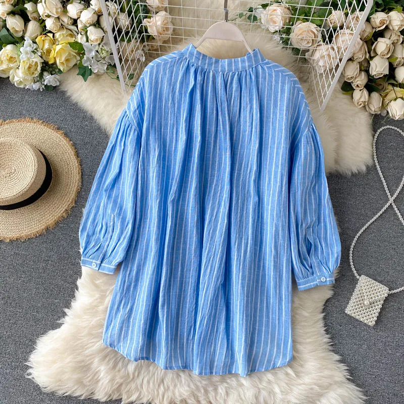 Женская блузка в полоску с перекрестными завязками V-образным вырезом и