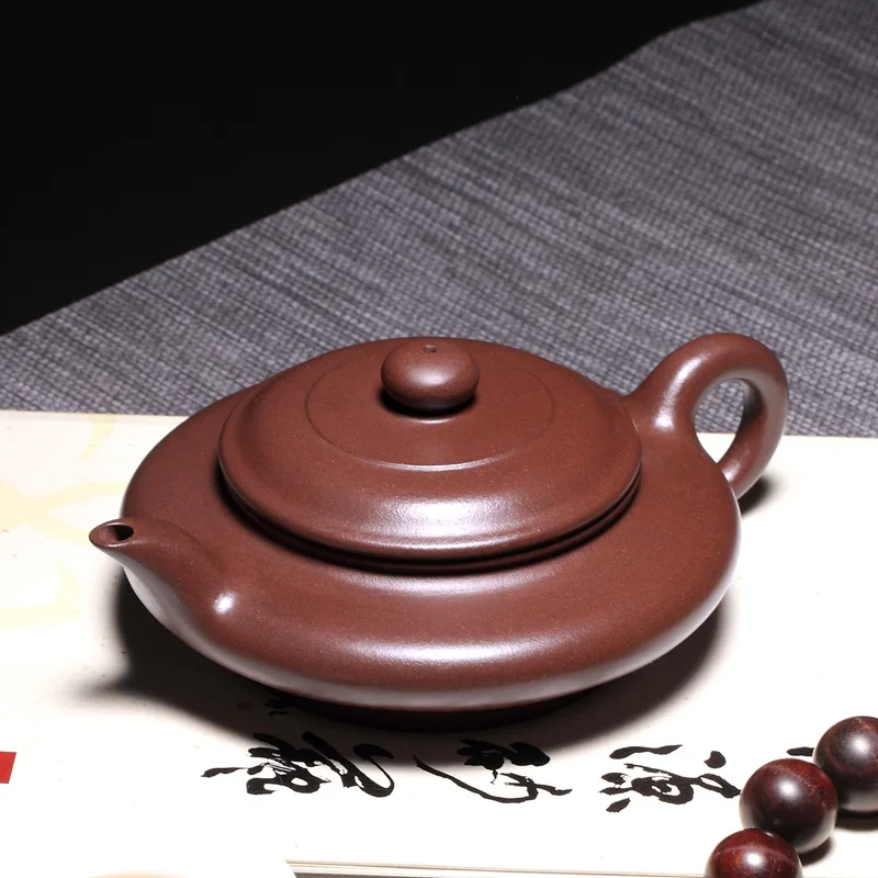 

TaoYuan 】 yixing famous xiao-lu li pure manual recommended purple clay teapot virtual flat pot 290 cc