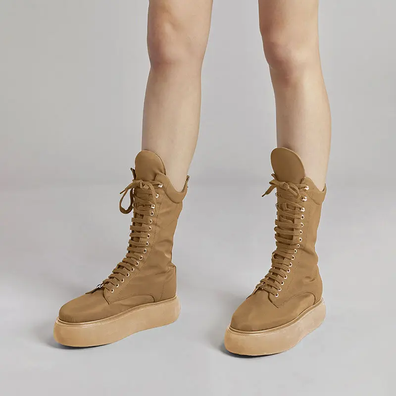 

Женские сапоги выше колена с круглым носком, на высоком каблуке