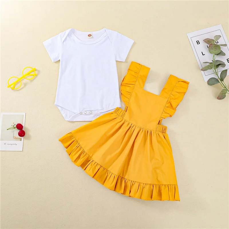 

Summer fashion Two Piece Baby Girl\u2019s Clothes Sweet Solid Color Short-sleeved Romper + Fresh Ruffles Suspender Skirt
