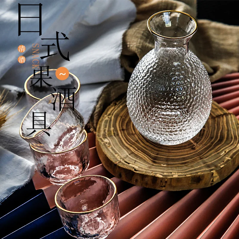 

Japanese wine set: Glass sake cup, pot, fruit plum small glass warmer, household suit