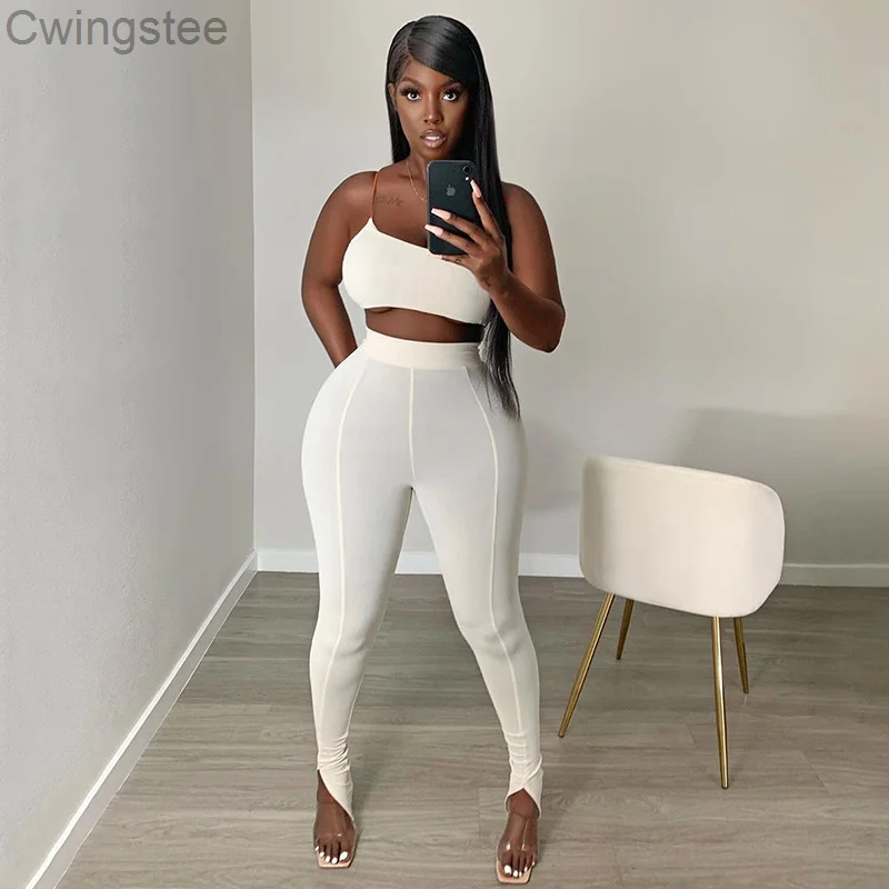 

Белый облегающий комплект на одно плечо, женский спортивный повседневный костюм Skinn из двух предметов, топ без рукавов и брюки с Боковым Раз...